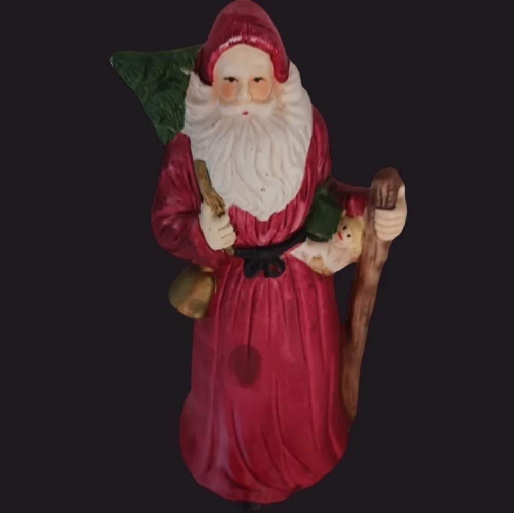 Santa fugurine with bell and christmas tree christmas decor